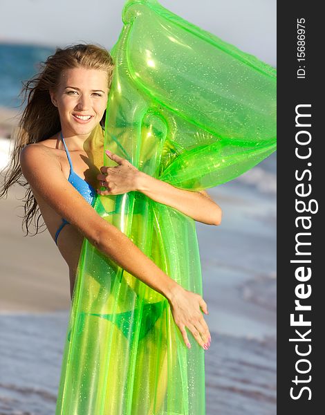 Young attractive girl on beach