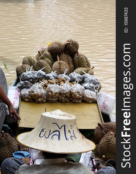 The tropical fruit it's in the floating market.