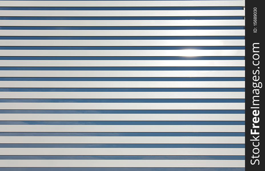 Pattern of metal fence and blue sky. Pattern of metal fence and blue sky