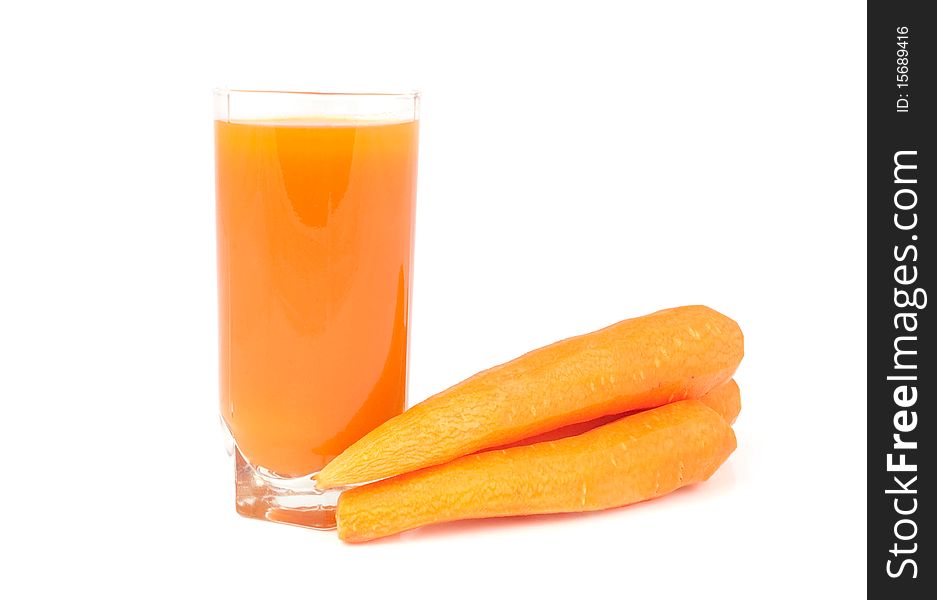 Glass of juice with carrot on a white background