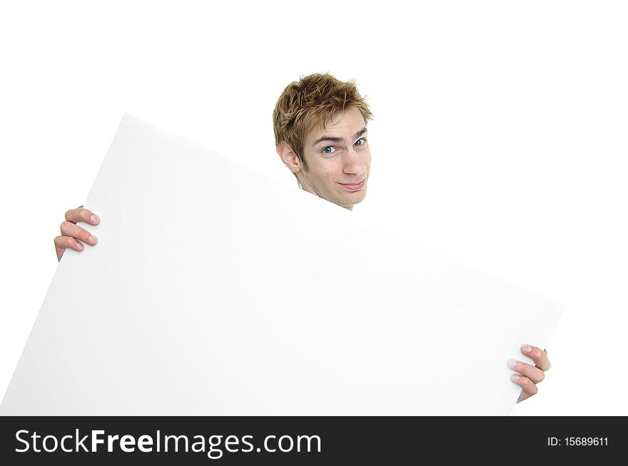 Young businessman holding a white cardboard sign with copyspace above and below. Young businessman holding a white cardboard sign with copyspace above and below