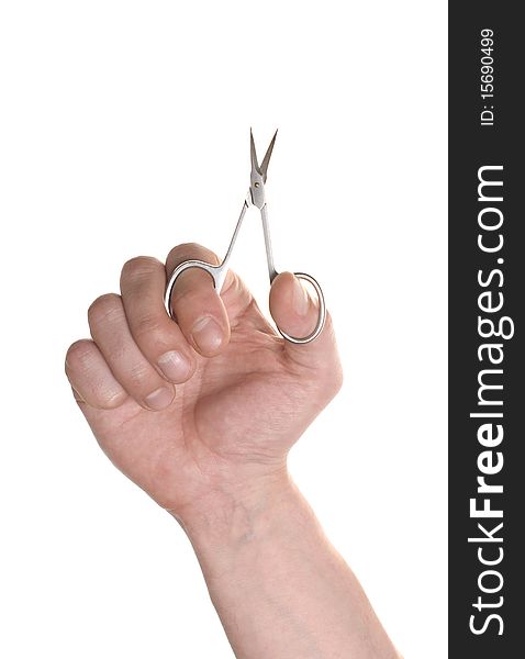Well shaped men's hand with a manicure scissors isolated over white