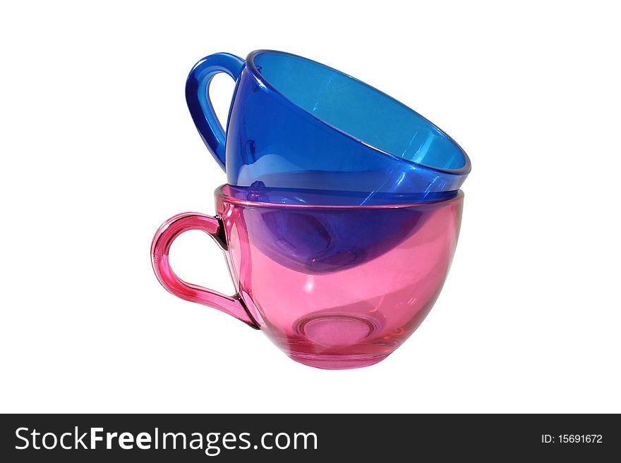 Red and blue teacups. Close-up. Isolated on white background.