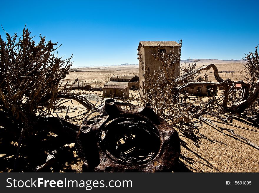 Old ruin in the abandoned diamond town Kolmanskop in Namibia