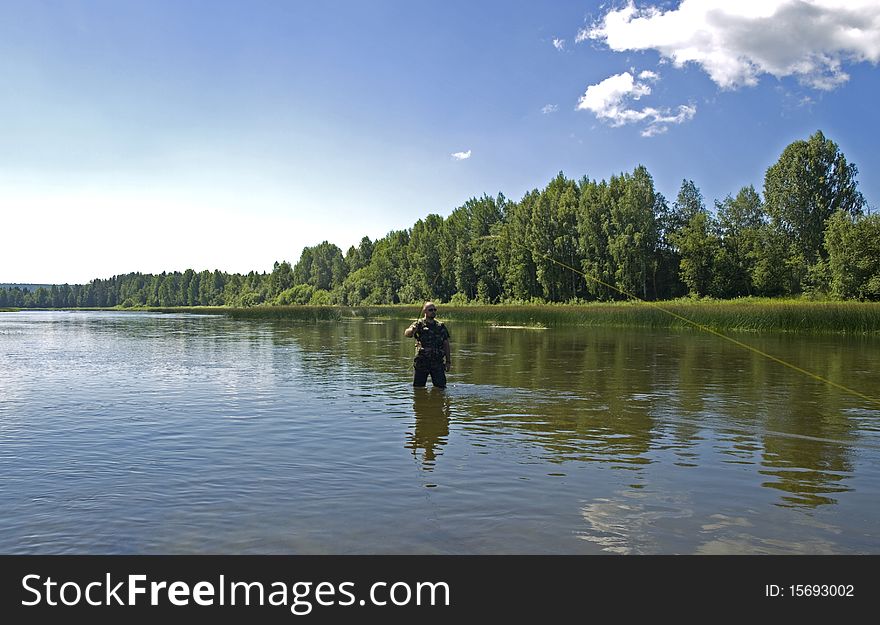 Photo of the fisherman on the river