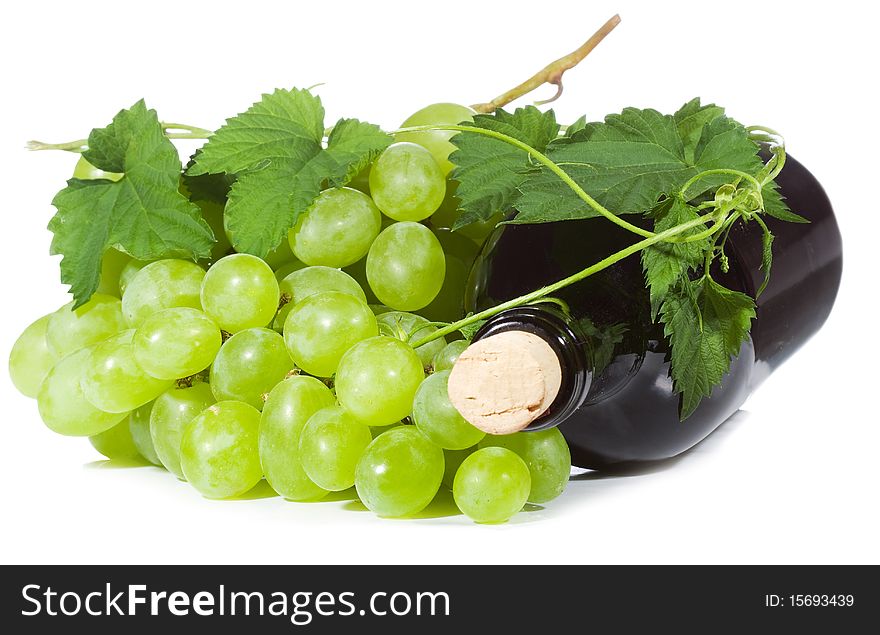 Green grape wirh bottle of with on white background. Green grape wirh bottle of with on white background