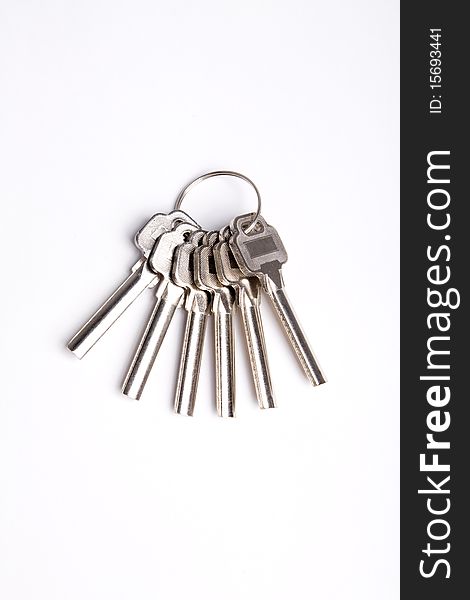 Keys on a keychain isolated on white with clipping path. Keys on a keychain isolated on white with clipping path