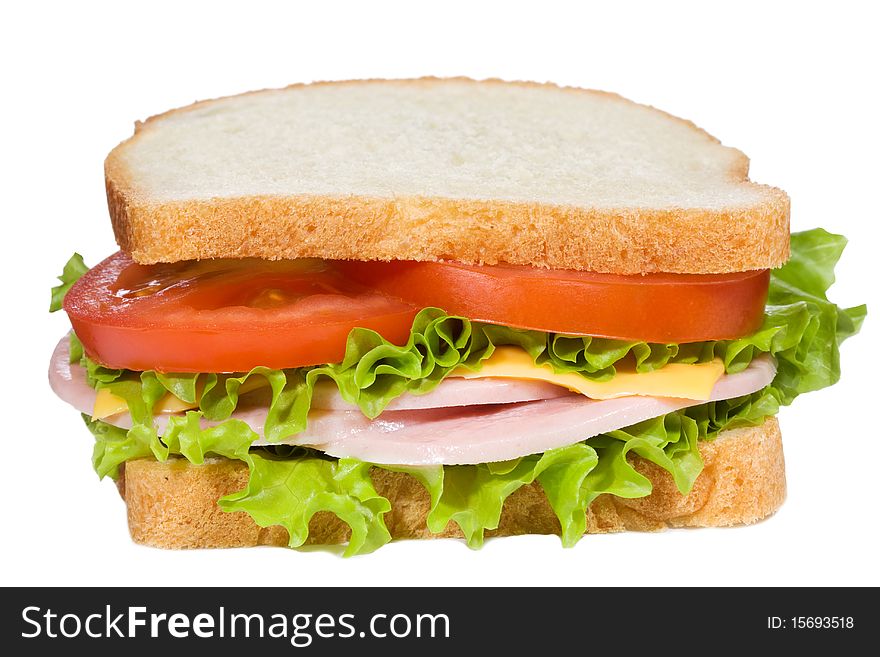 Sandwich with ham and vegetables on white background