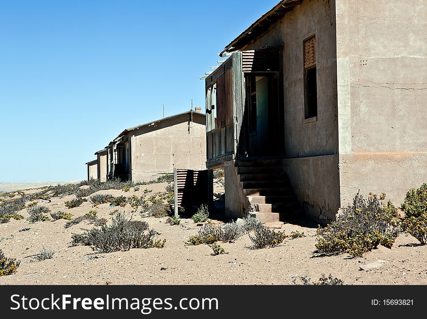 Old ruin in the abandoned diamond town Kolmanskop in Namibia