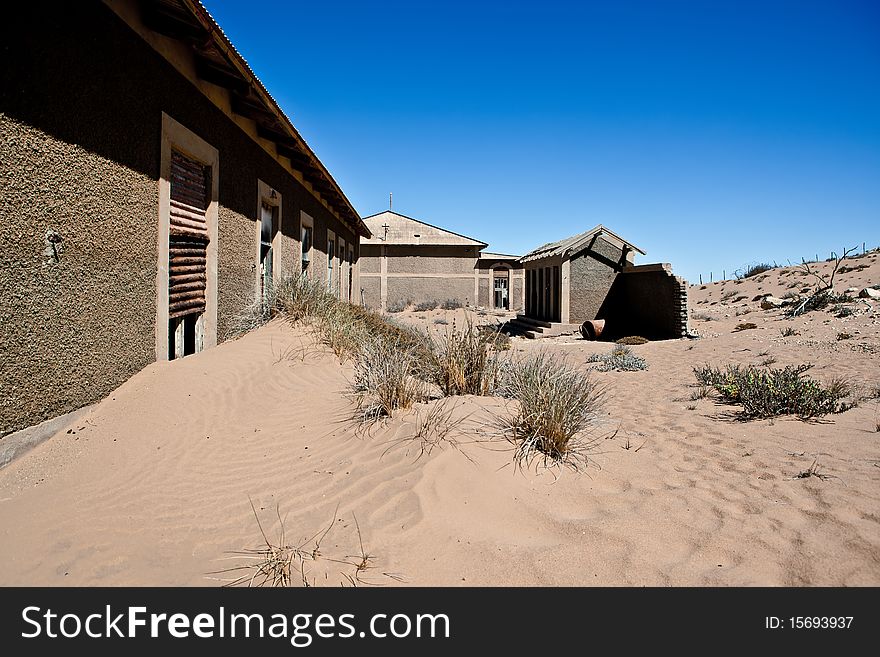 Old ruin in the abandoned diamond town Kolmanskop in Namibia