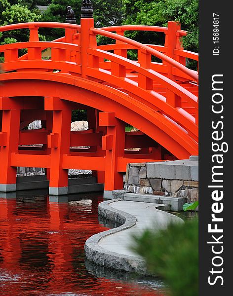 Bright colored bridge taken in Hong Kong's Nan Lian Garden. The bridge was built in a Tang Dynasty style. Bright colored bridge taken in Hong Kong's Nan Lian Garden. The bridge was built in a Tang Dynasty style.