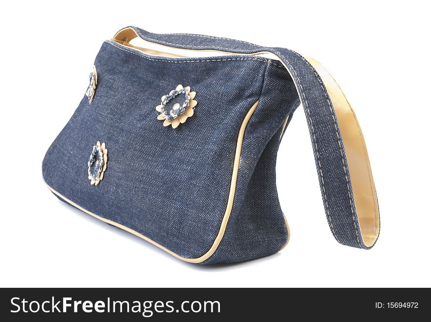 Jeans handbag with flowers. Isolated on white background. Jeans handbag with flowers. Isolated on white background