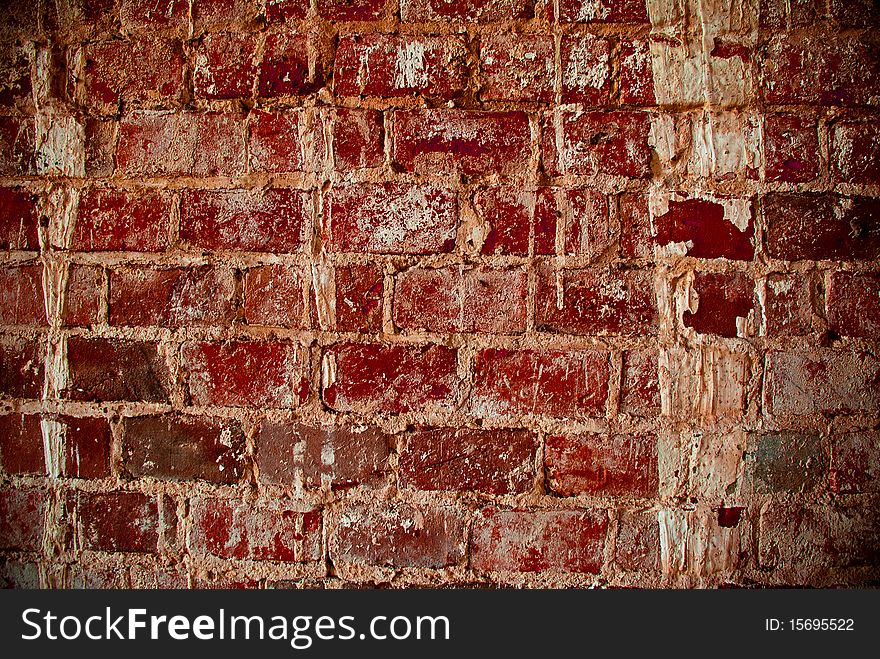 Old red textured brick wall