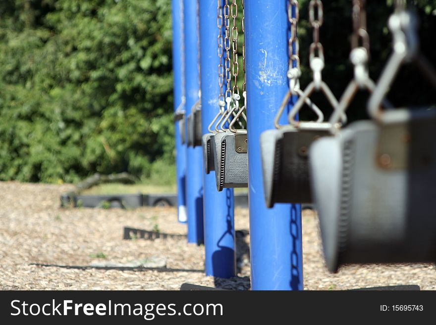 Empty Swings at a Playground