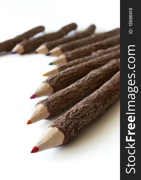 Colored pencils isolated on white background