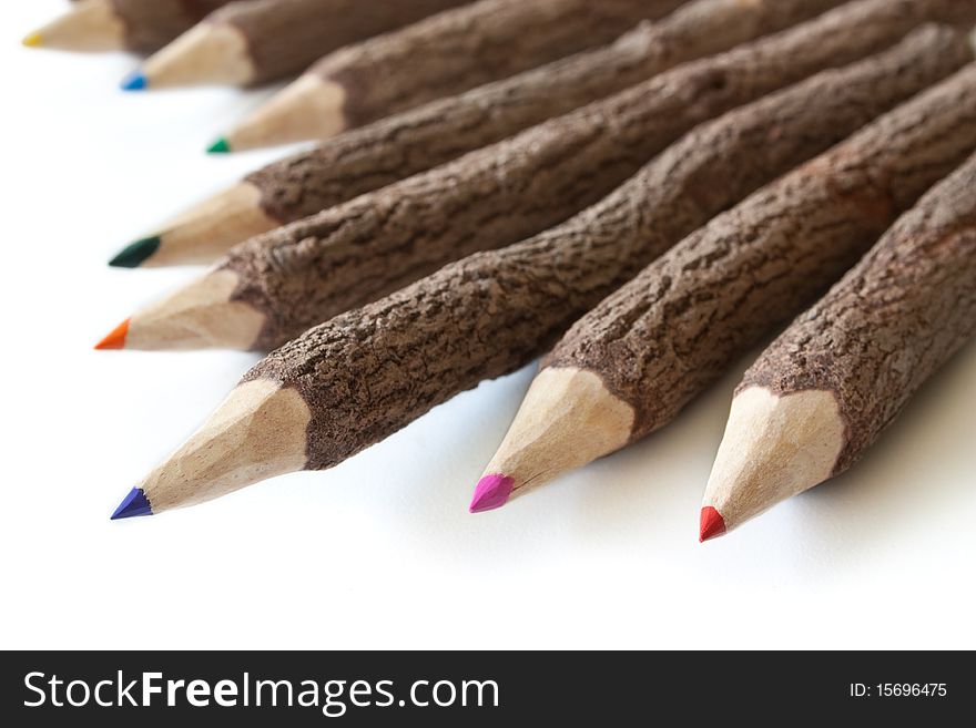 Colored pencils isolated on white background