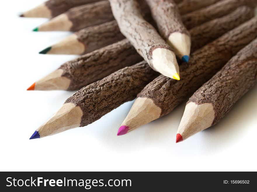 Colored pencils isolated on white background