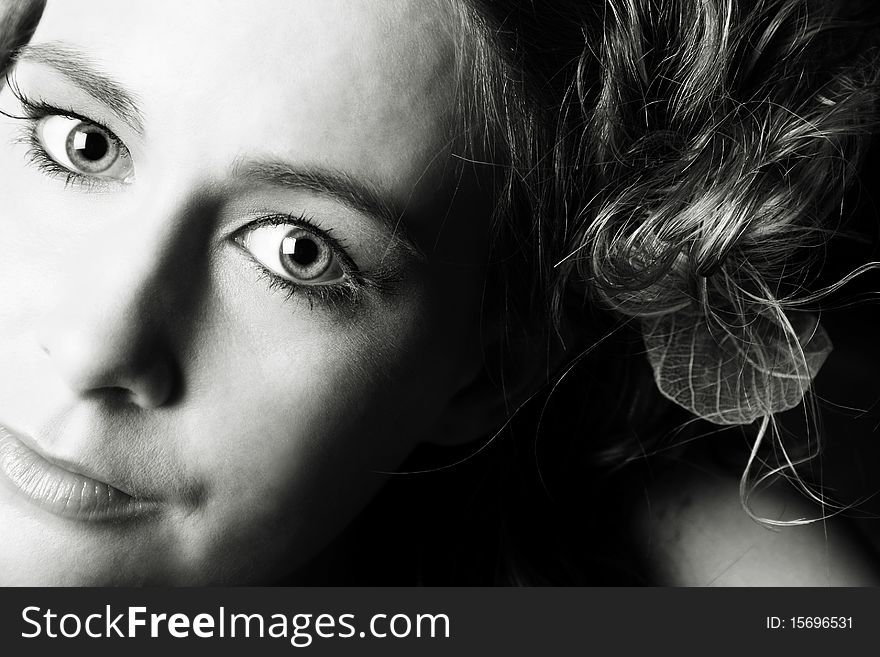 Toned image of a blond female model with big eyes. Toned image of a blond female model with big eyes