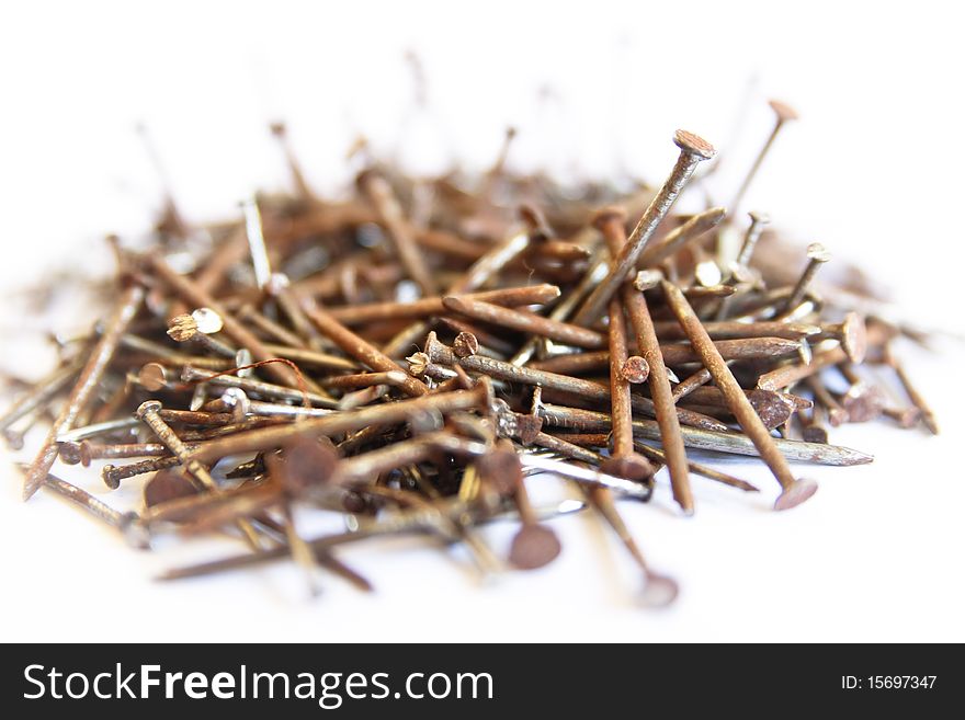 Several nails rust on a white background. Several nails rust on a white background.