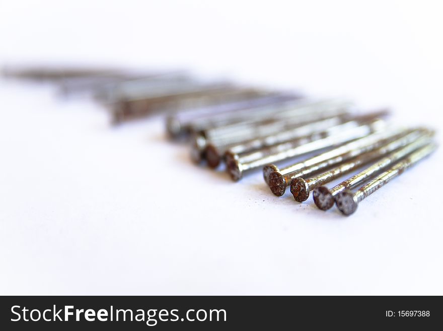 Several nails rust on a white background. Several nails rust on a white background.