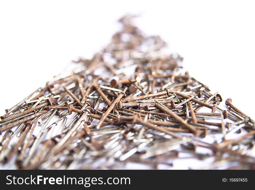 Several nails rust on a white background. Several nails rust on a white background.