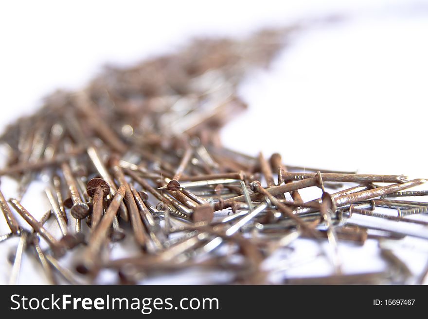 Several nails rust on a white background. Several nails rust on a white background.