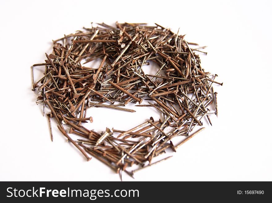 Several nails rust on a white background. Several nails rust on a white background.