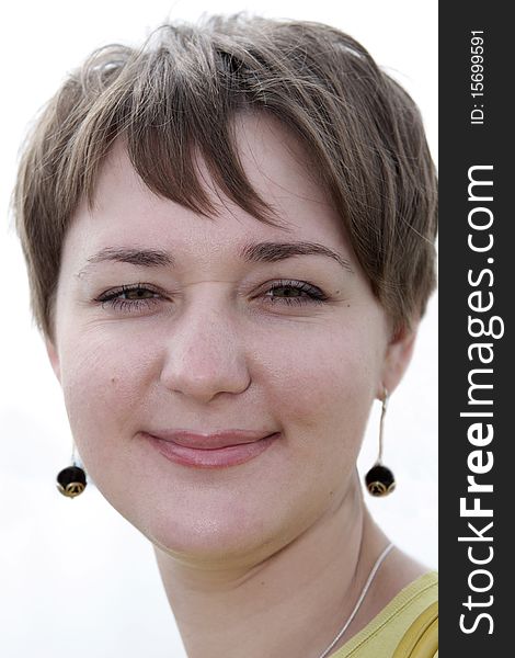 Smiley young brunette girl with short hair. Smiley young brunette girl with short hair