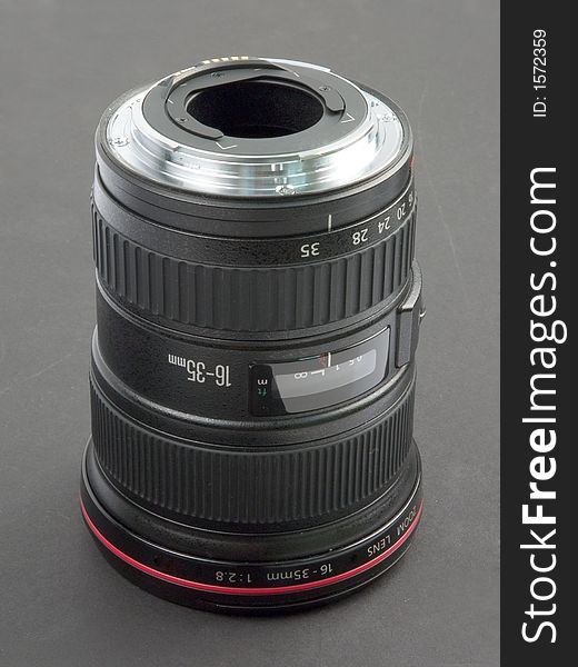 Professional digital camera zoom lens over black