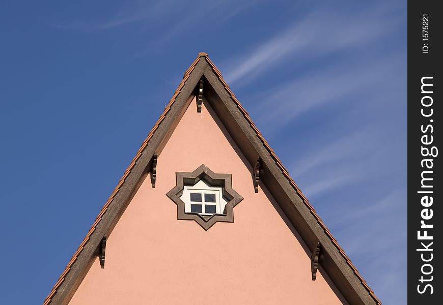 Gable of a baroque house in front of blue sky