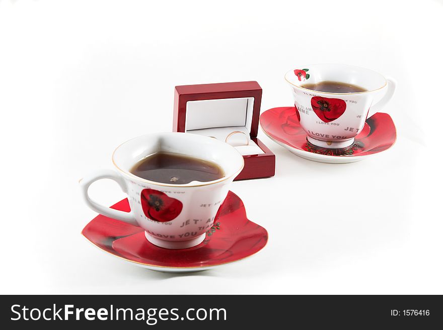 Lovers Tea-drinking (two hert-shaped cups and two rings)