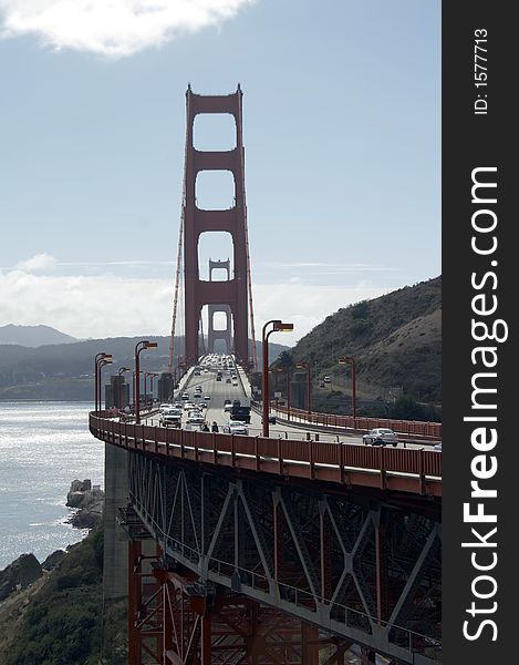 Traffic on the Golden Gate Bridge, San Francisco, backlight, view from sausalito, California. Traffic on the Golden Gate Bridge, San Francisco, backlight, view from sausalito, California