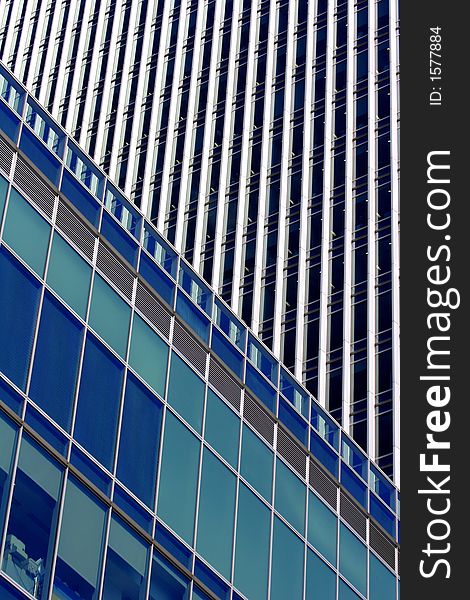 Reflection, shapes and textures of modern office building