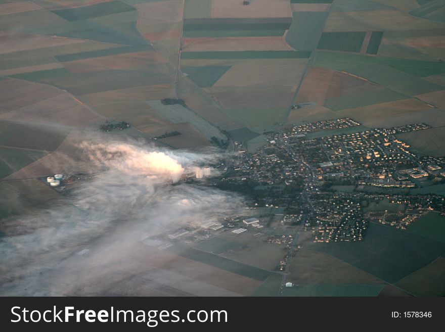 Industrial smog on a french village