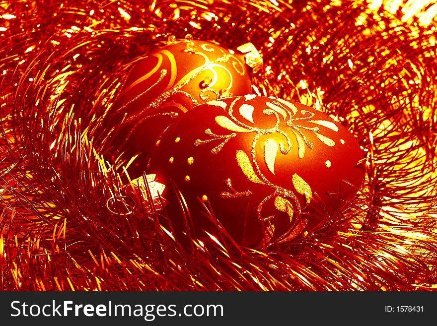 Red christmas balls and shiny spangle, soft-focused closeup. Red christmas balls and shiny spangle, soft-focused closeup