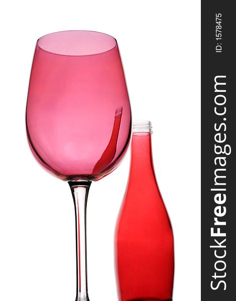 Contemporary red wine glass and bottle. Contemporary red wine glass and bottle