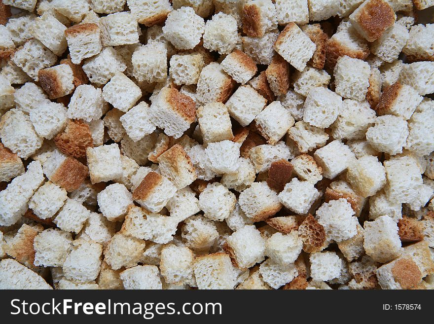 A background of croutons that can be used for holiday stuffing. A background of croutons that can be used for holiday stuffing