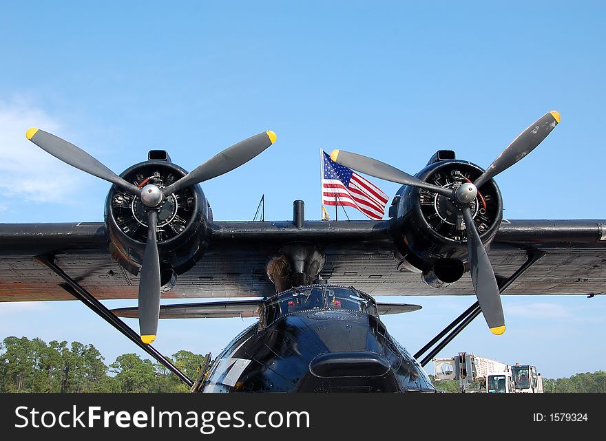 Vintage black seaplane with american flag. Vintage black seaplane with american flag