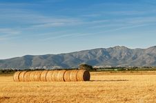 Rolls Of Hay Against Mountains. Stock Images Rolls Of Hay Against Mountains. Stock Images