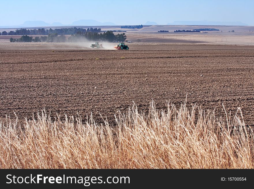 Tractors Planting Wheat