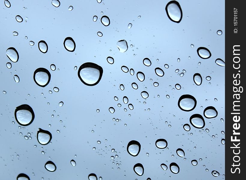 Raindrops on a Blue Background. Raindrops on a Blue Background