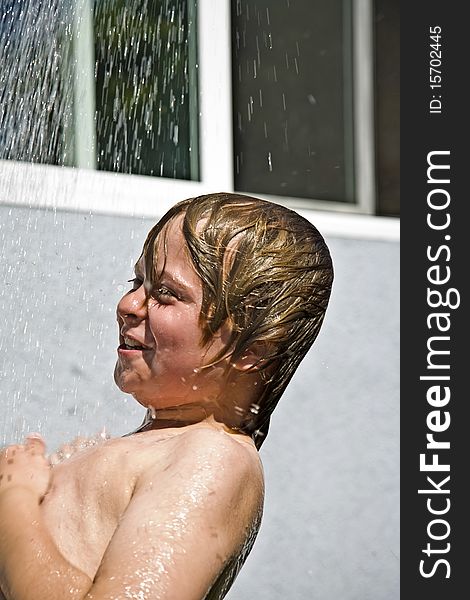 Child Has A Refreshing Shower