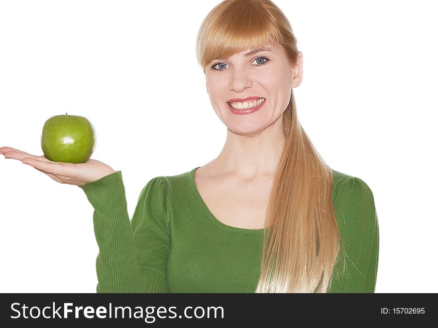 Green apple in a hand on white background. Green apple in a hand on white background