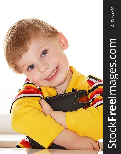 Portrait of the boy with the book in a hand. Portrait of the boy with the book in a hand