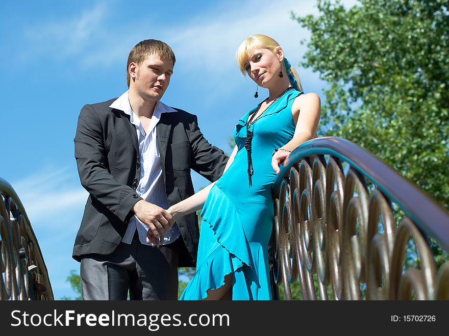 Portrait of a happy young couple in park