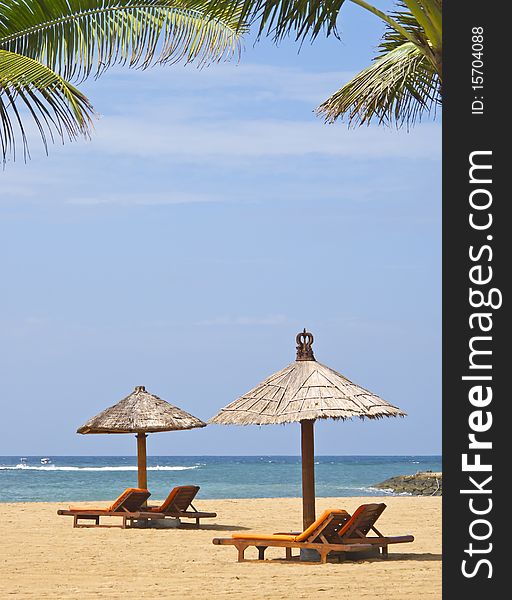 Beach chairs on perfect tropical sandy beach. Beach chairs on perfect tropical sandy beach