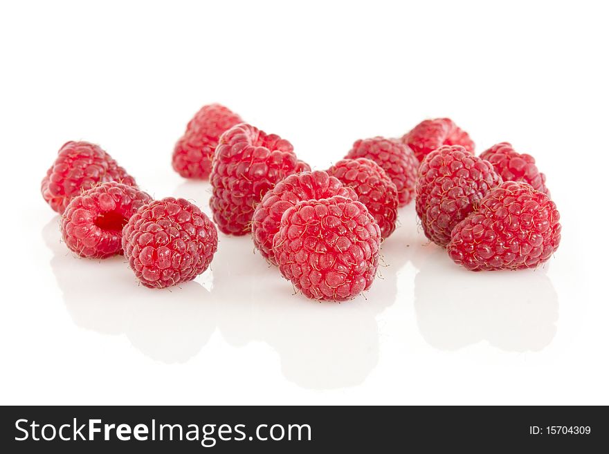 Group of raspberries isolated on white