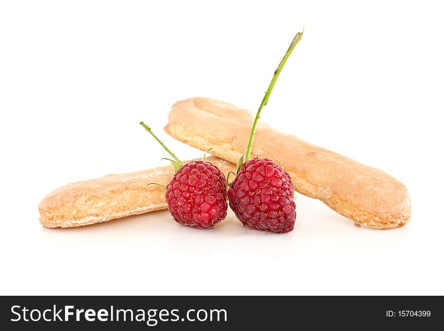 Biscuits and raspberries isolated on white. Biscuits and raspberries isolated on white