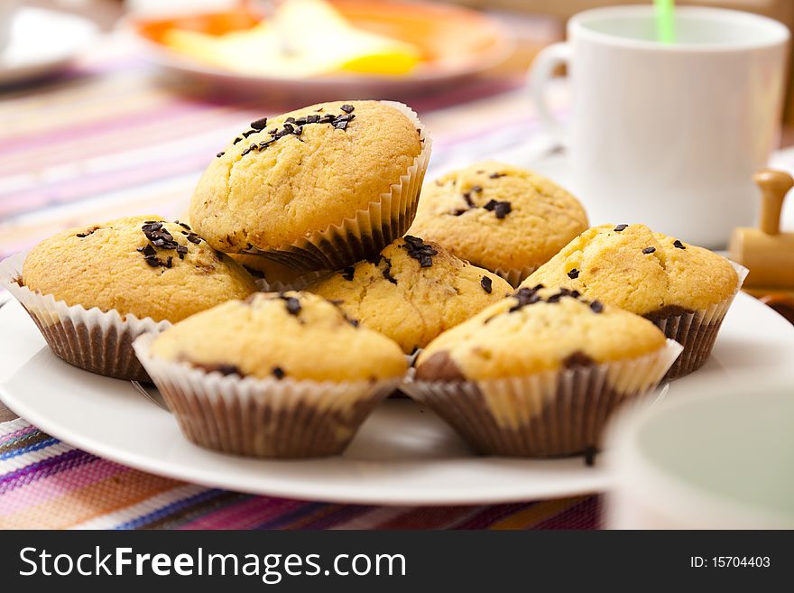 Chocolate chip muffins on a plate