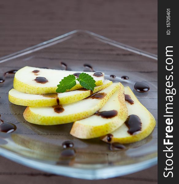 Pear slices garnish with chocolate. Pear slices garnish with chocolate